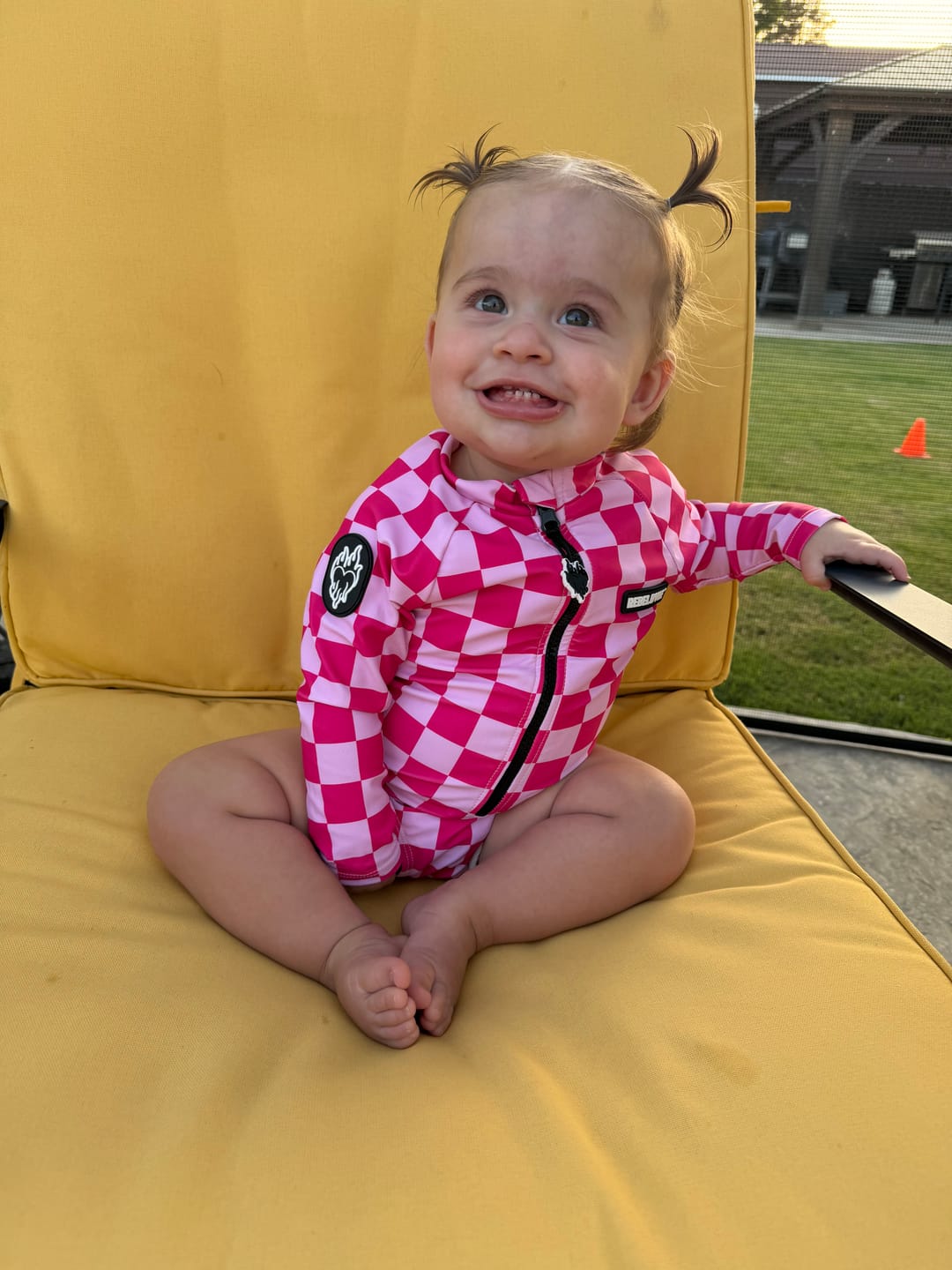 Customer photo review of UPF50+ Girls One Piece Swimsuit in Bubble Gum Checkered