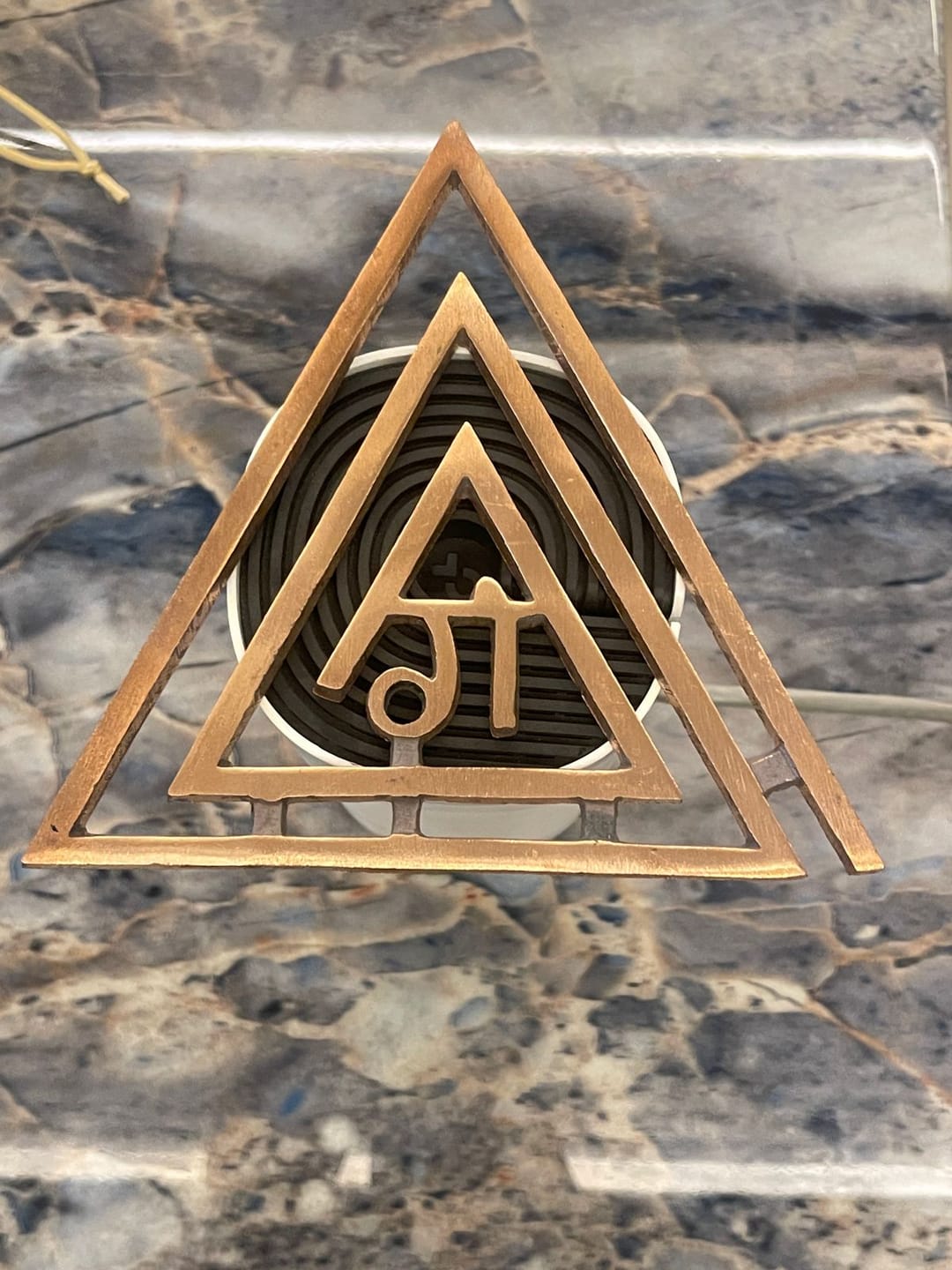 Customer photo review of Copper Triangle  Gii (गी) Helix – Vastu Remedy for South-East Direction Correction | Fire Element Balance | 4 Inch & 6 Inch