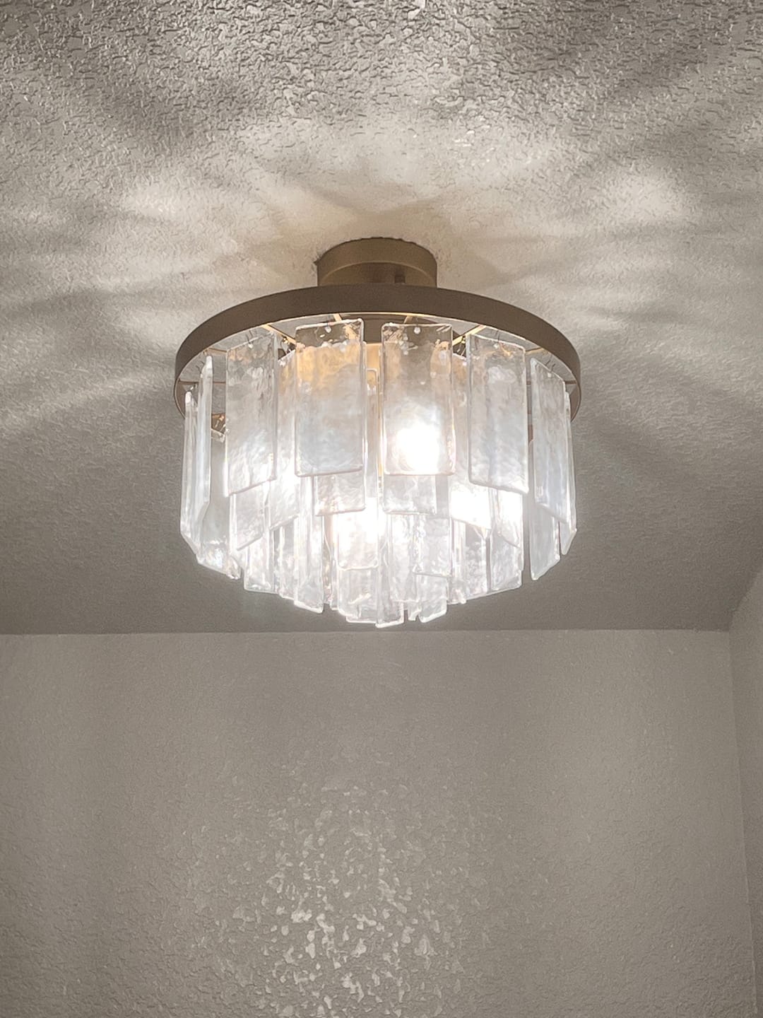 Customer photo review of Tiered Hammered Water Glass Round Semi Flush Mount