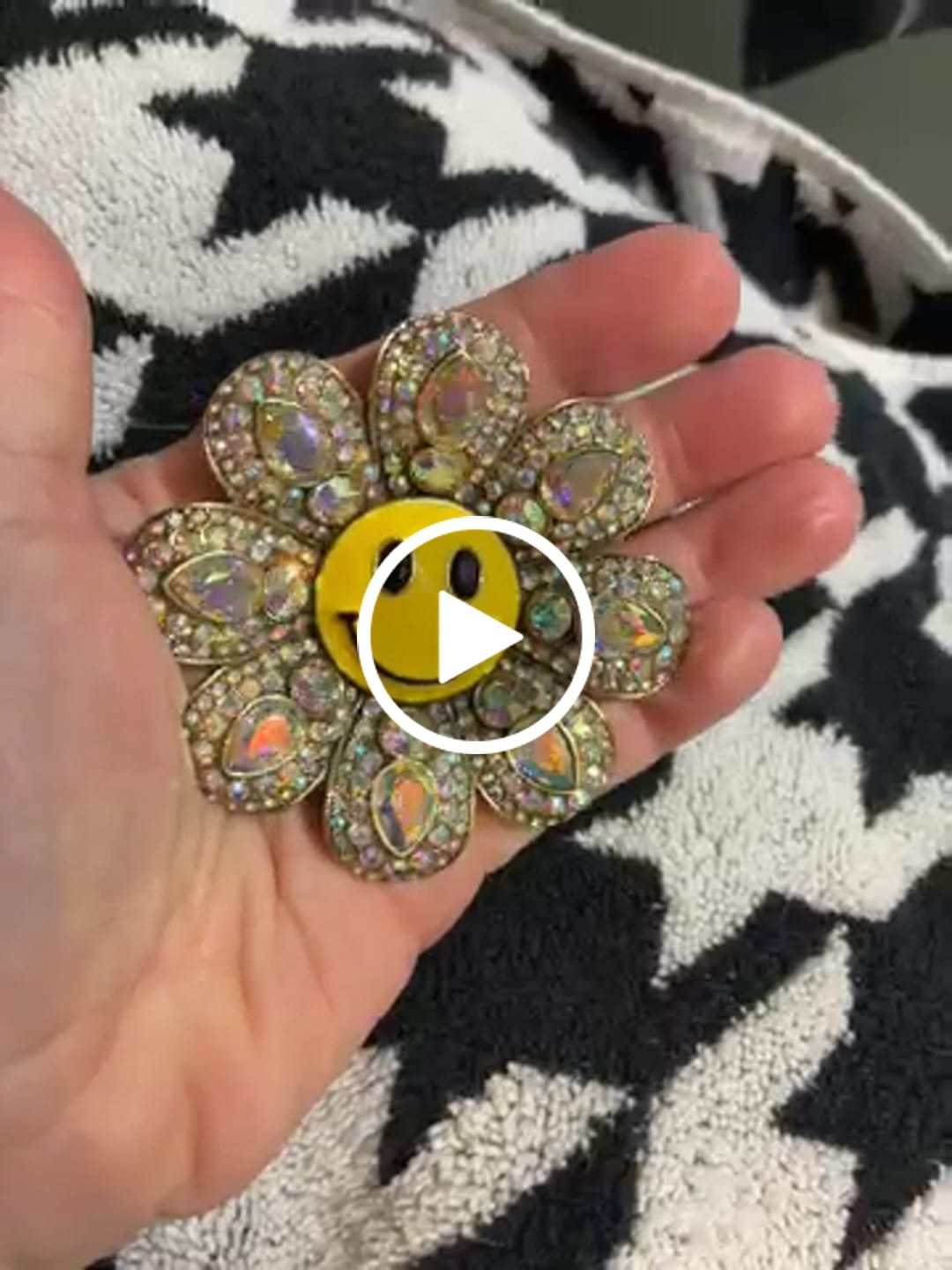 Customer video review of HEIDI DAUS® “Smiles For Miles” Crystal Smiley Face Statement Pin