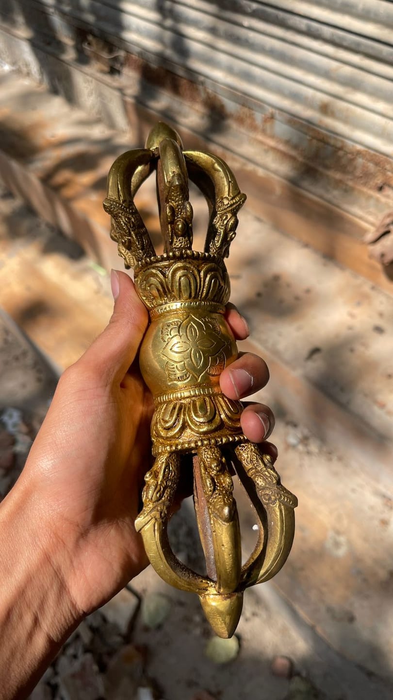 Customer photo review of Pure Brass Vajra Idol Vastu Remedy for Protection, Spiritual Strength and Ritual Energy for Home  | 22 x 6.6 cm | 1.1 kg