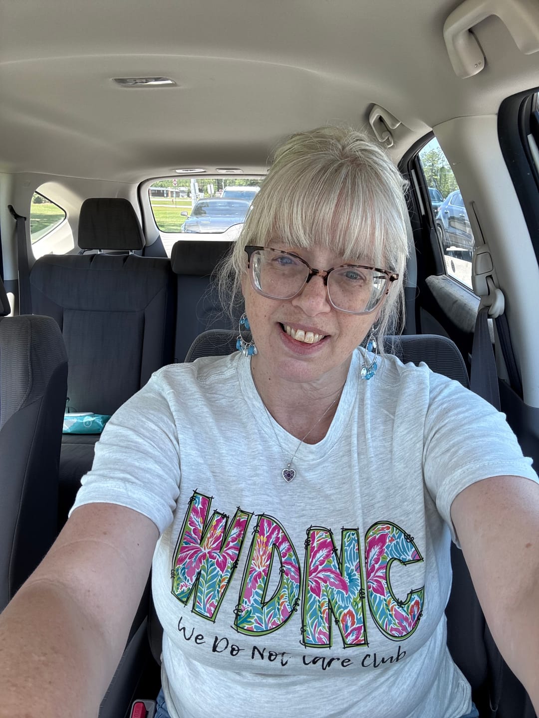 Customer photo review of We Do Not Care Club, WDNC, Trending Graphic Tee, Tshirt