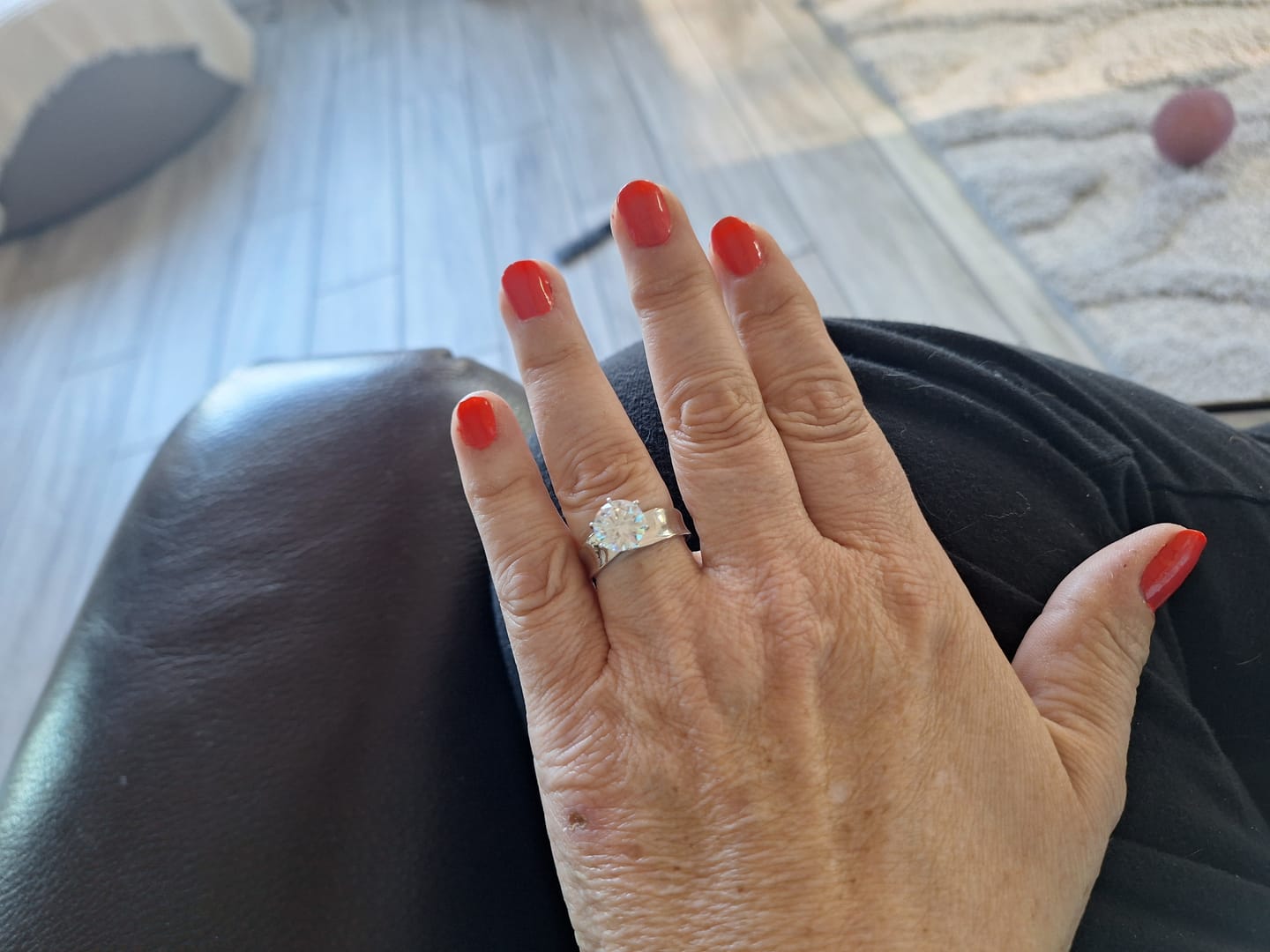 Customer photo review of Solitaire Round Moissanite Concave Wide Band Engagement Ring