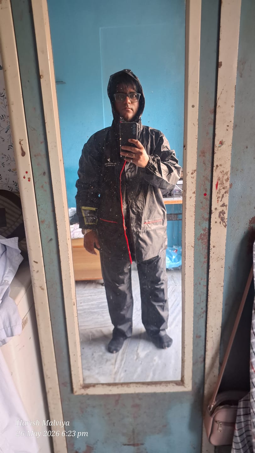 Customer photo review of Black with Red Border - Rain Jacket with Pant and Mobile Pouch
