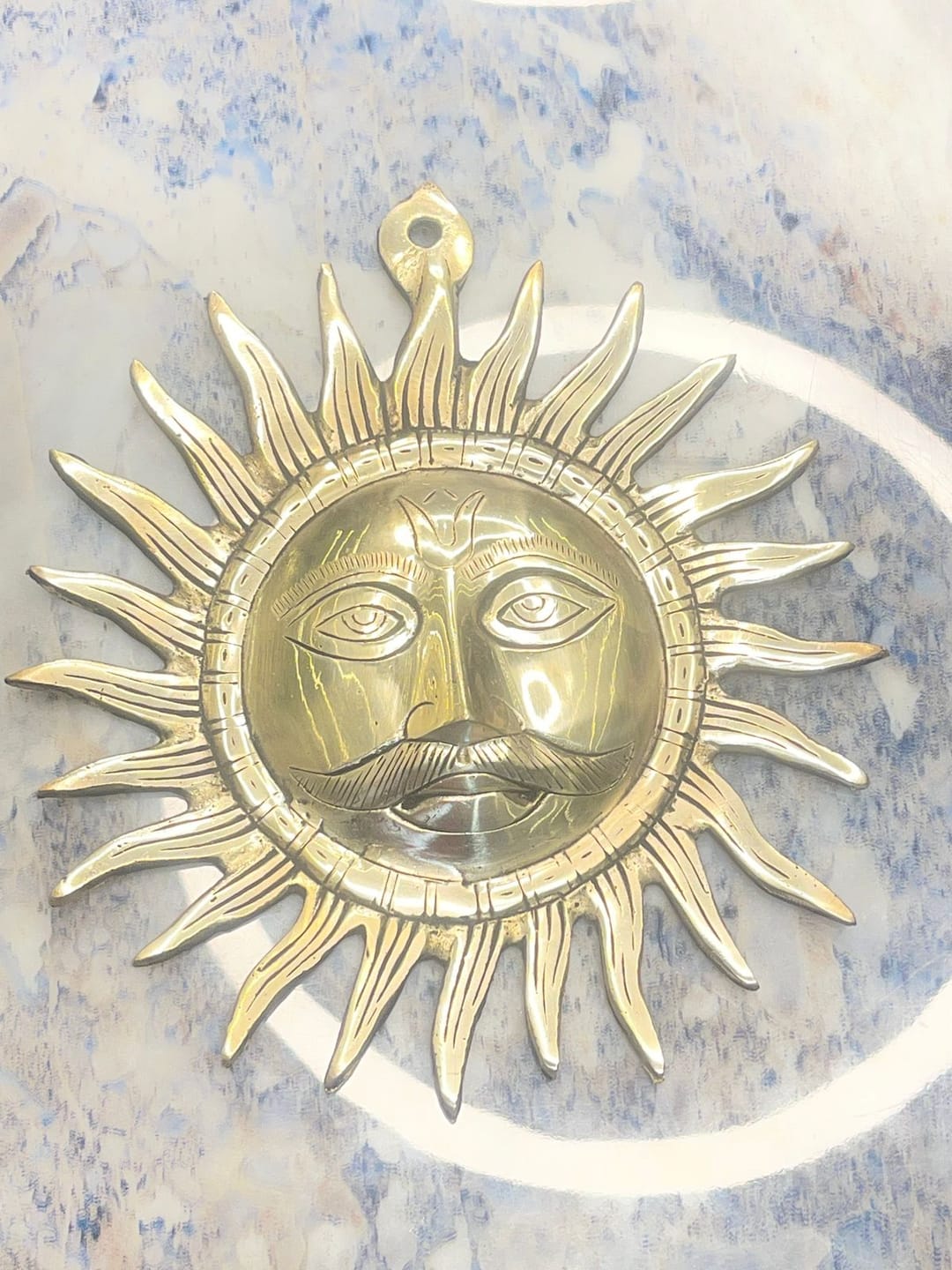 Customer photo review of Brass Surya (Sun) Ji Wall Hanging Idol Vastu Remedy for East Direction Balance, Fame and Positive Energy | 24 X 24 cm | 1 kg