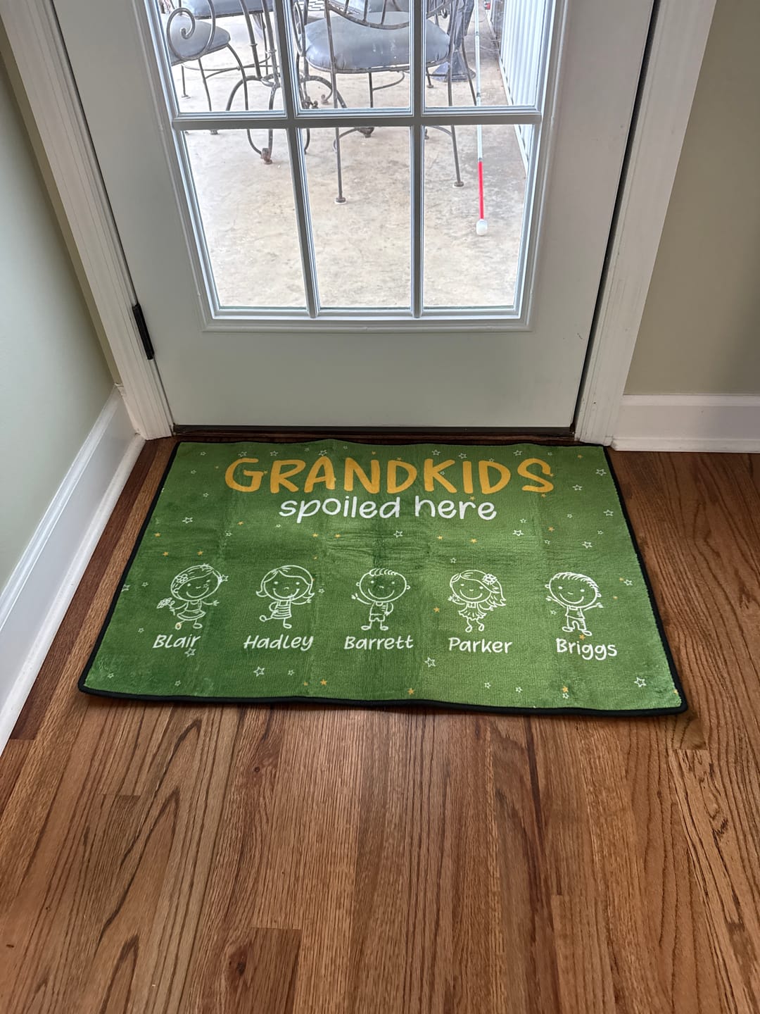 Customer photo review of Grandkids Spoiled Here Doodle - Personalized Doormat