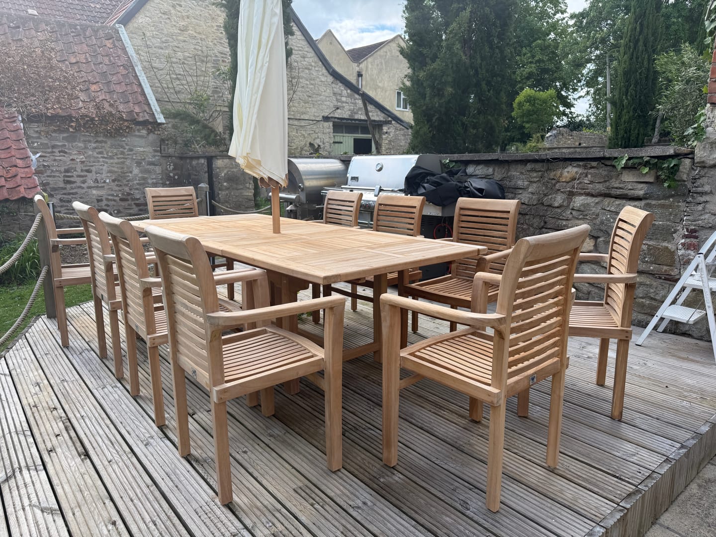 Customer photo review of Teak 2-3m Extending Rectangle Table (10 Seat Oxford Stacking Set) Complete set Cushions included.