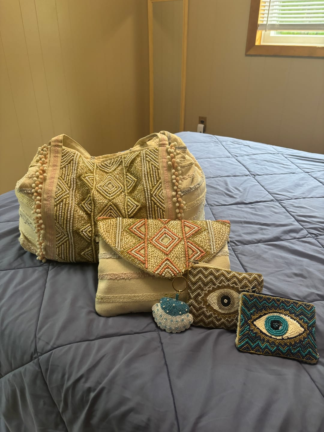Customer photo review of Grecian Nights Evil Eye Embellished Mini Pouches
