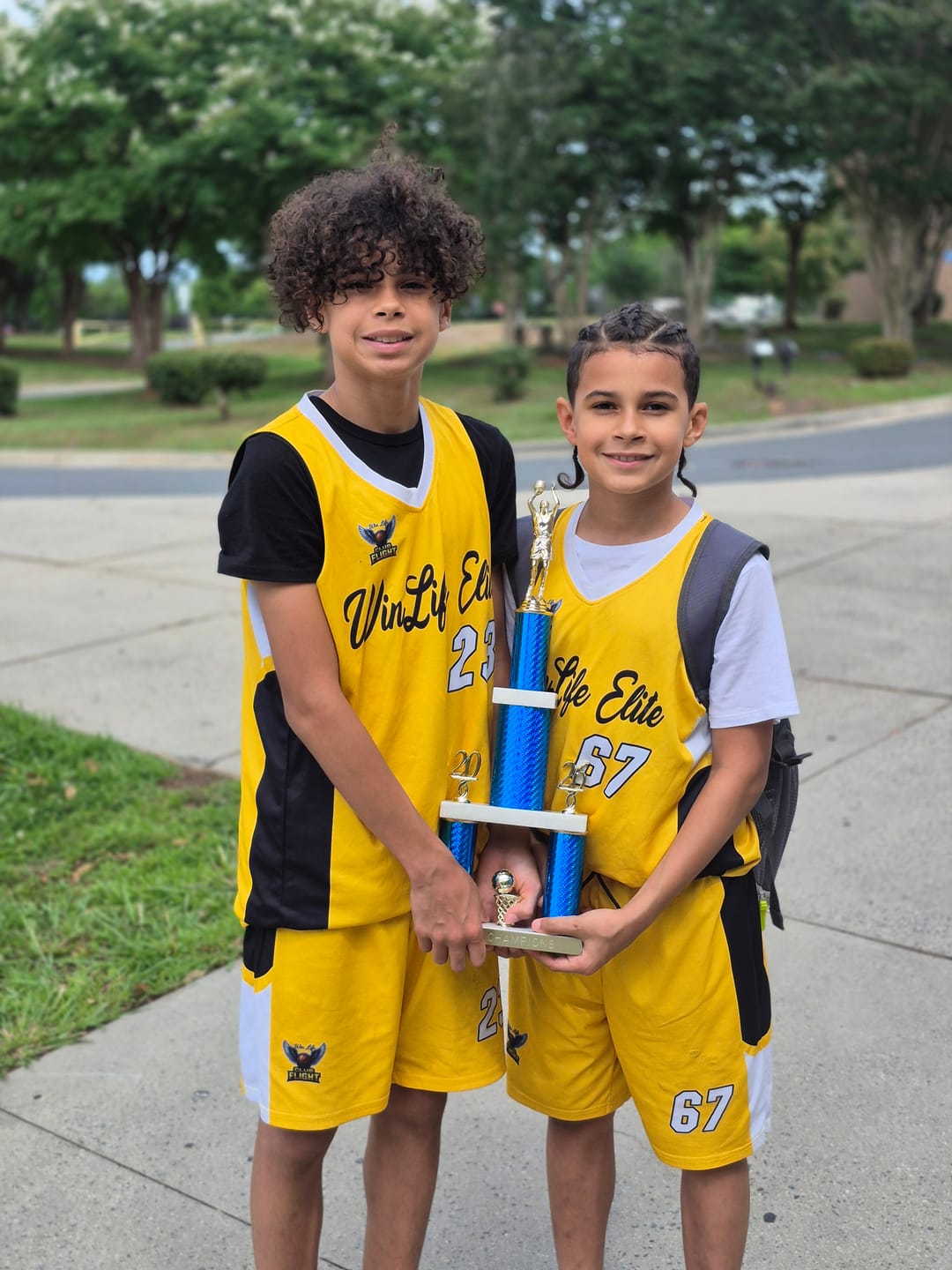 Customer photo review of Custom Black Gold Side U-shaped Patttern Double Side Sports Uniform Basketball Jersey