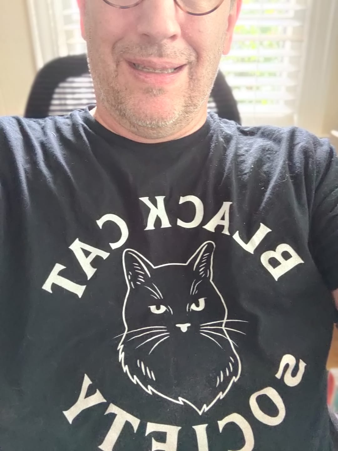 Customer photo review of Black Cat Society Tee