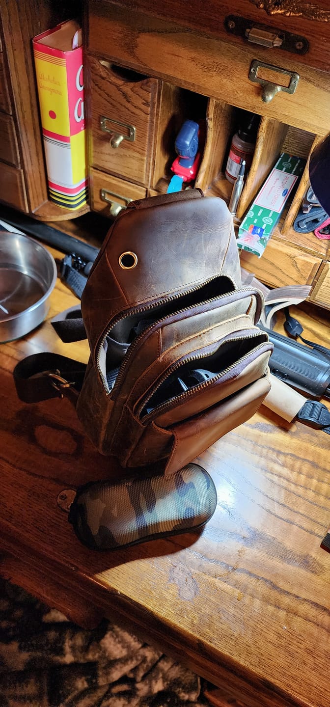 Customer photo review of Cowhide Leather Sling Bag
