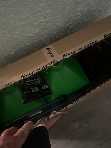 Customer's view of the new green 5 Gallon Jug as they open the shipping box.