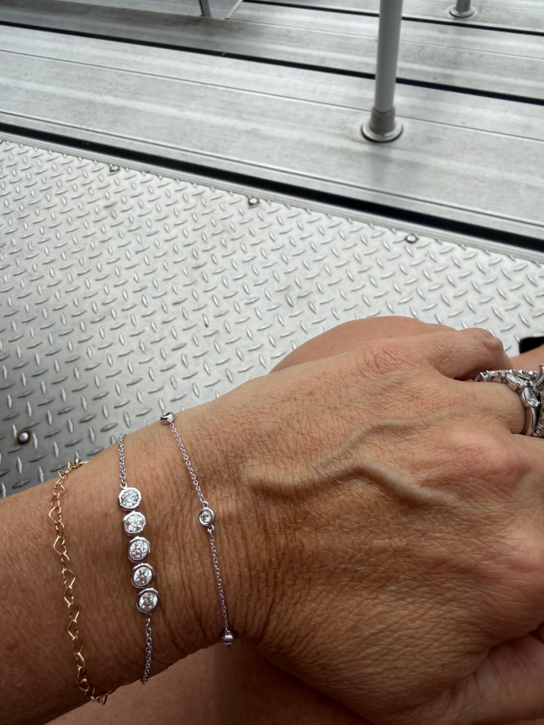 Customer photo review of 1.43ctw Hexagonal Brilliant Cut Diamond Bezel 5-Stone Bracelet, White Gold