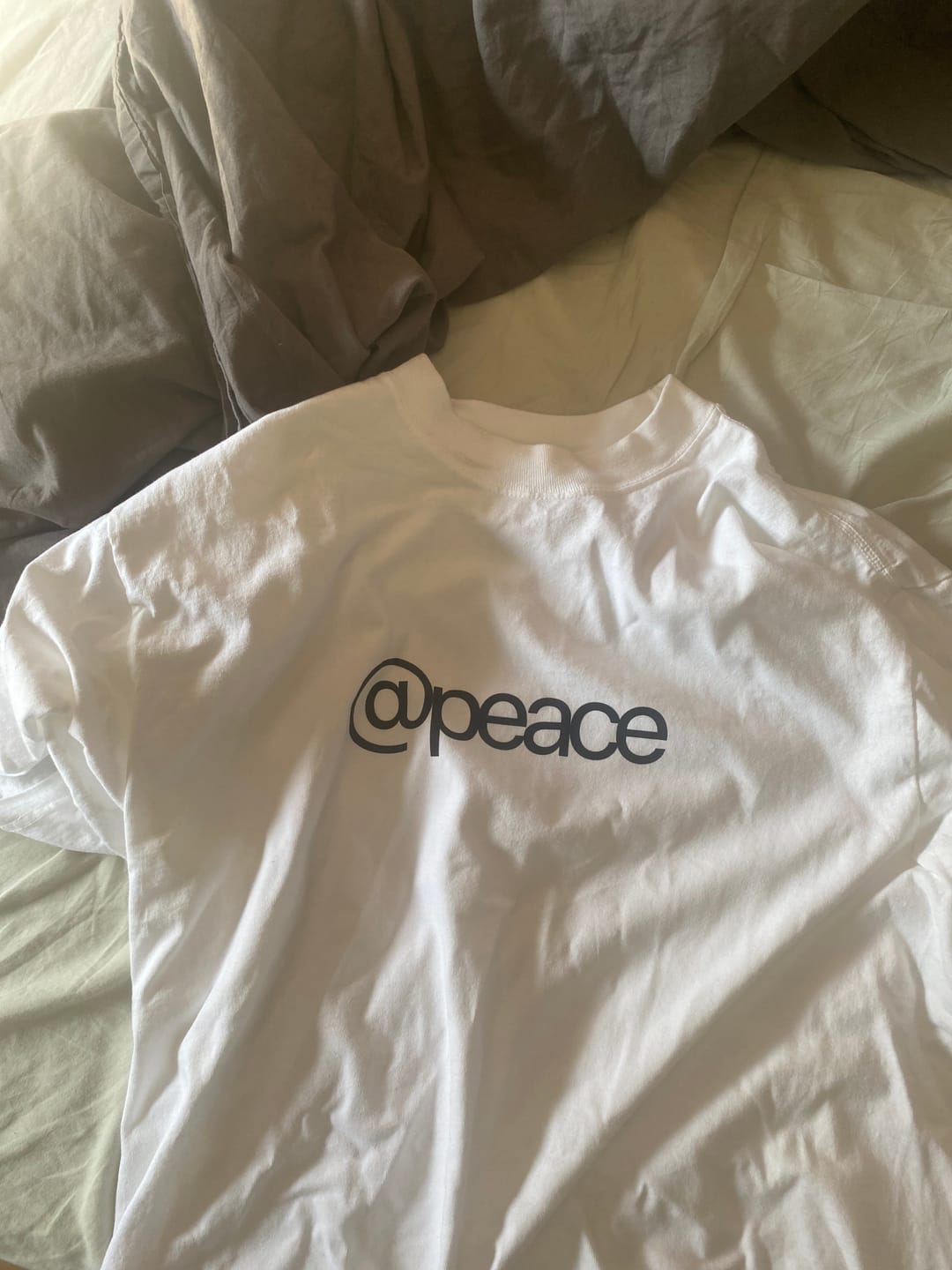 Customer photo review of @peace tee