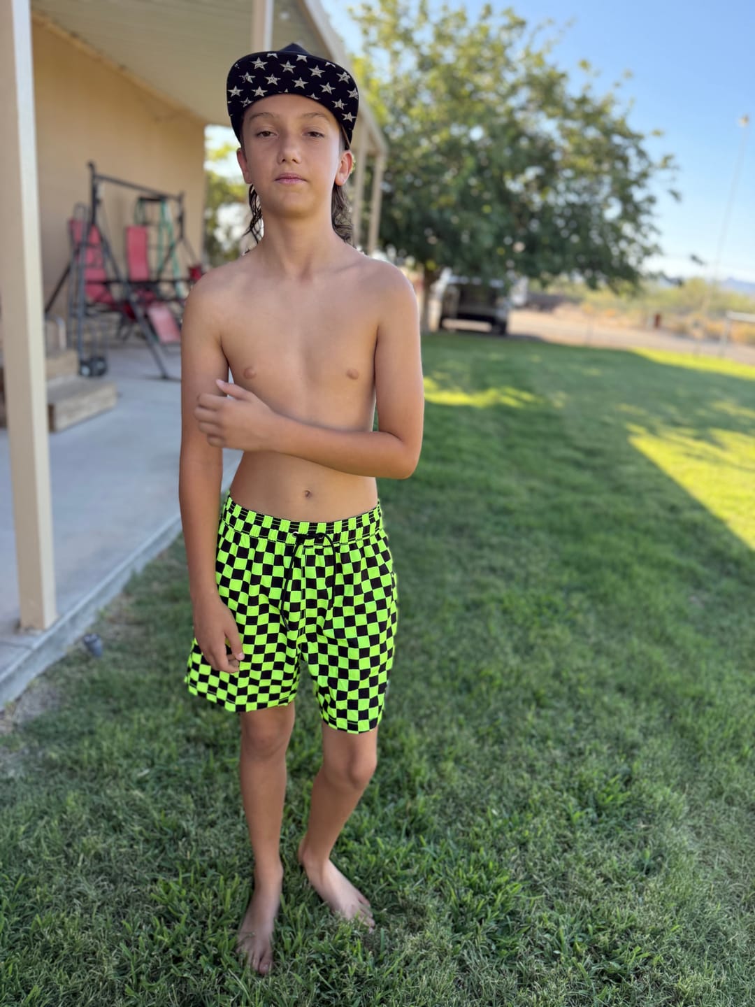 Customer photo review of Men's Hybrid Swim Trunks in Neon Electric Lime + Black Checkered