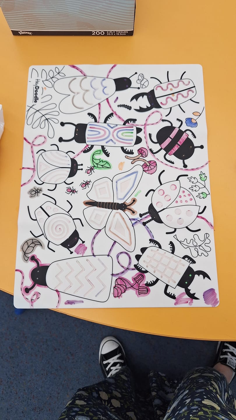 Customer photo review of Busy Bugs Sensory Colouring & Doodle Mat