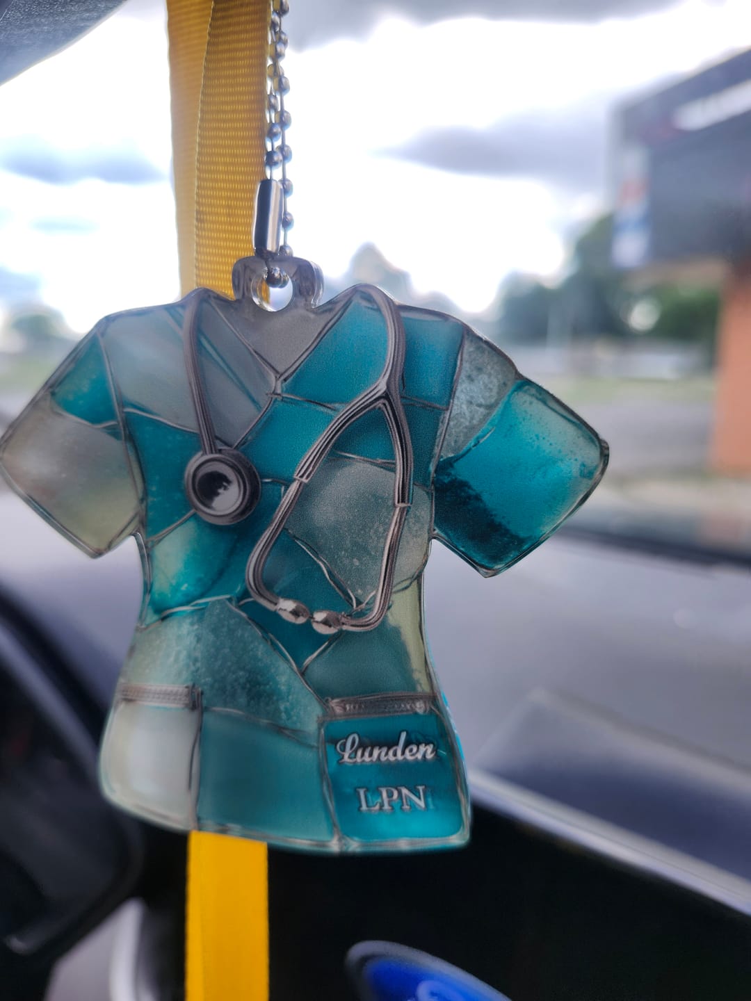 Customer photo review of Sea Glass Nurse Scrub - Personalized Car Ornament