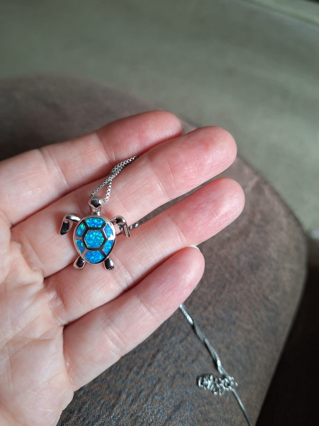 Customer photo review of Save the Sea Turtle Necklace