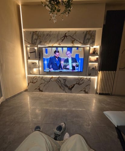 Customer photo review of Panneau Mural PVC Marbre Qatar – Veiné doré, Facile a Poser