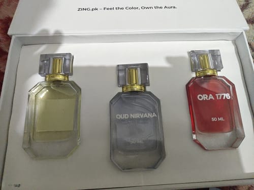 A reviewer's photo of the OUD Supreme BUNDLE, with the three perfume bottles displayed in their open presentation box.