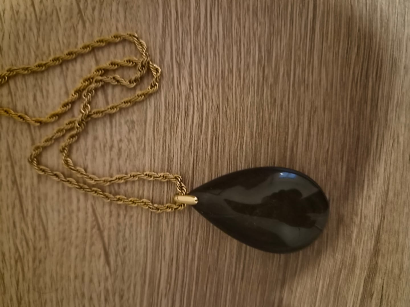 Customer photo review of Pendentif Obsidienne Dorée