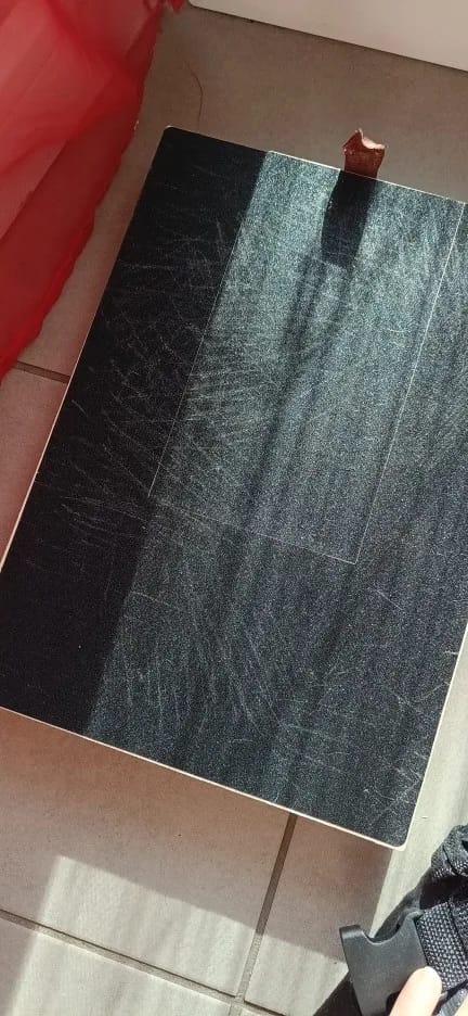 Customer photo review of Dog Nail Scratch Board with Treat Box – Stress Free Nail Filing for Dogs