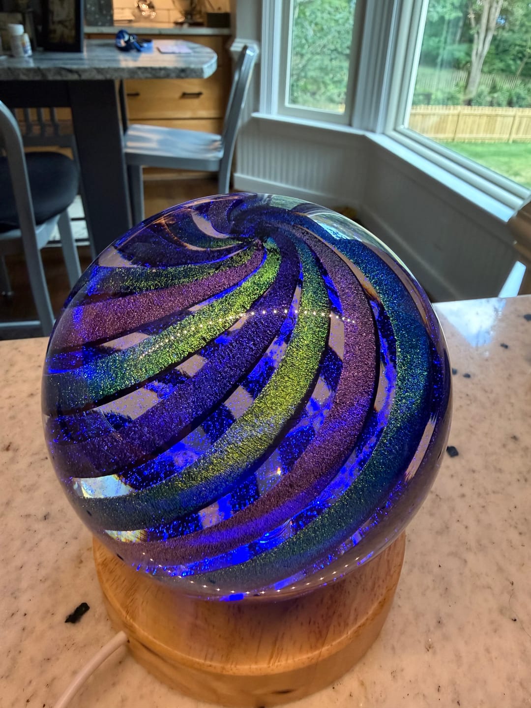 Customer photo review of Dark Dichroic Rainbow Orb with Cremation Ash
