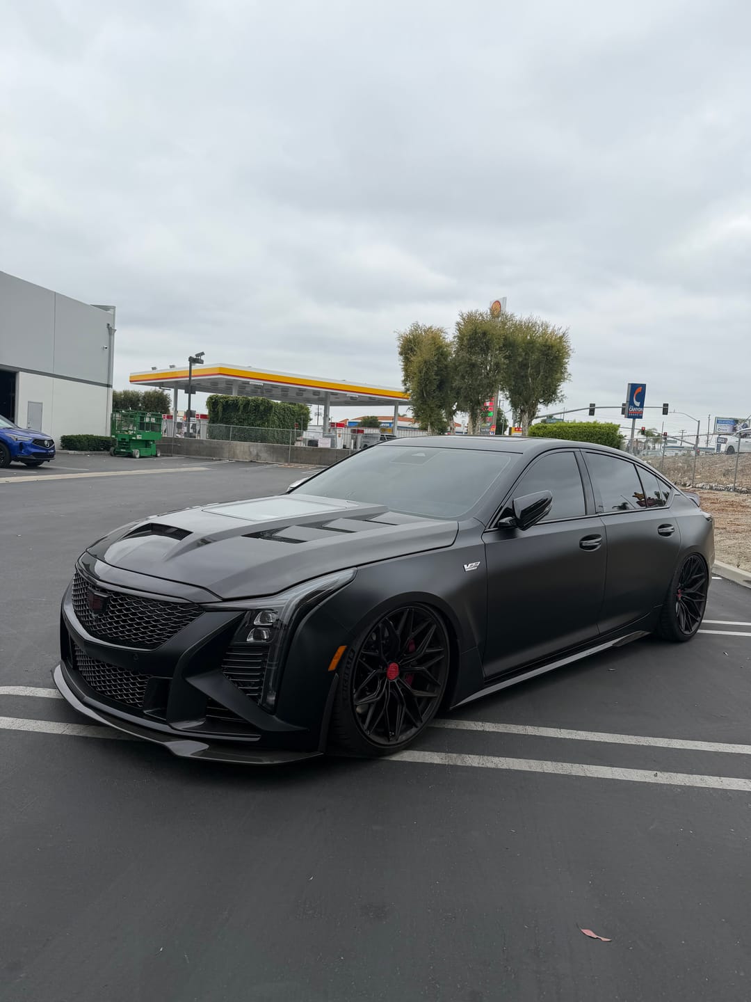Customer photo review of 2020-2026 Cadillac CT5 / V-Blackwing Type-Terminator w/Glass Double Sided Gloss V-Shaped Dry Carbon Fiber Hood
