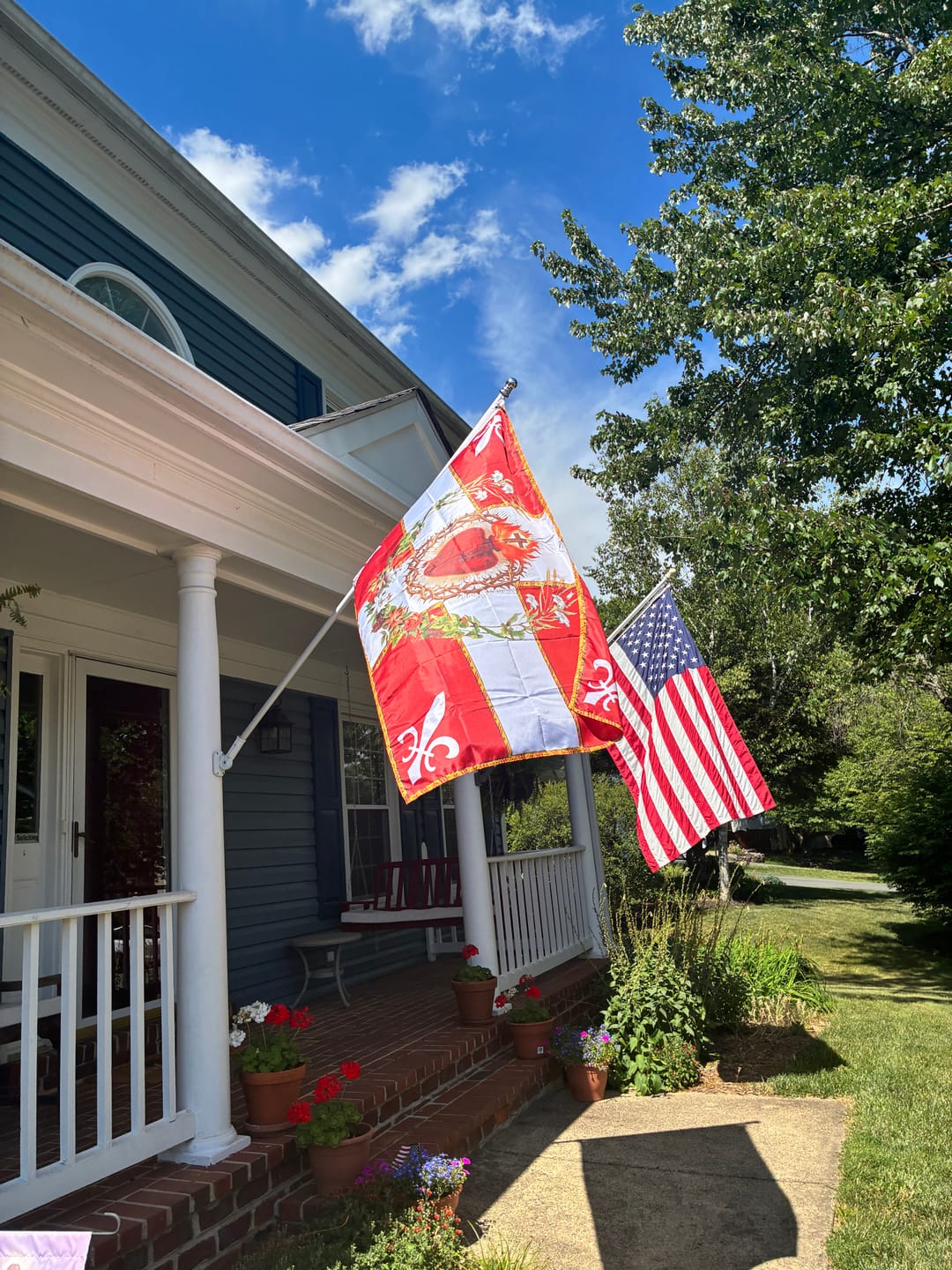 Customer photo review of Flag of the Sacred Heart – Red – Indoor/outdoor Flag – Polyester – 2x3, 3x5 and 4x6.