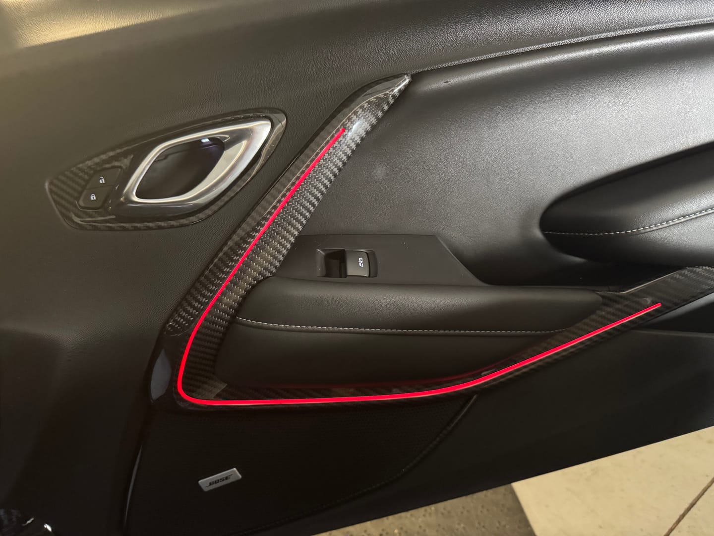 Customer photo review of 2016-2024 Camaro Real Carbon Fiber Interior Door Panel Chrome Trim Cover