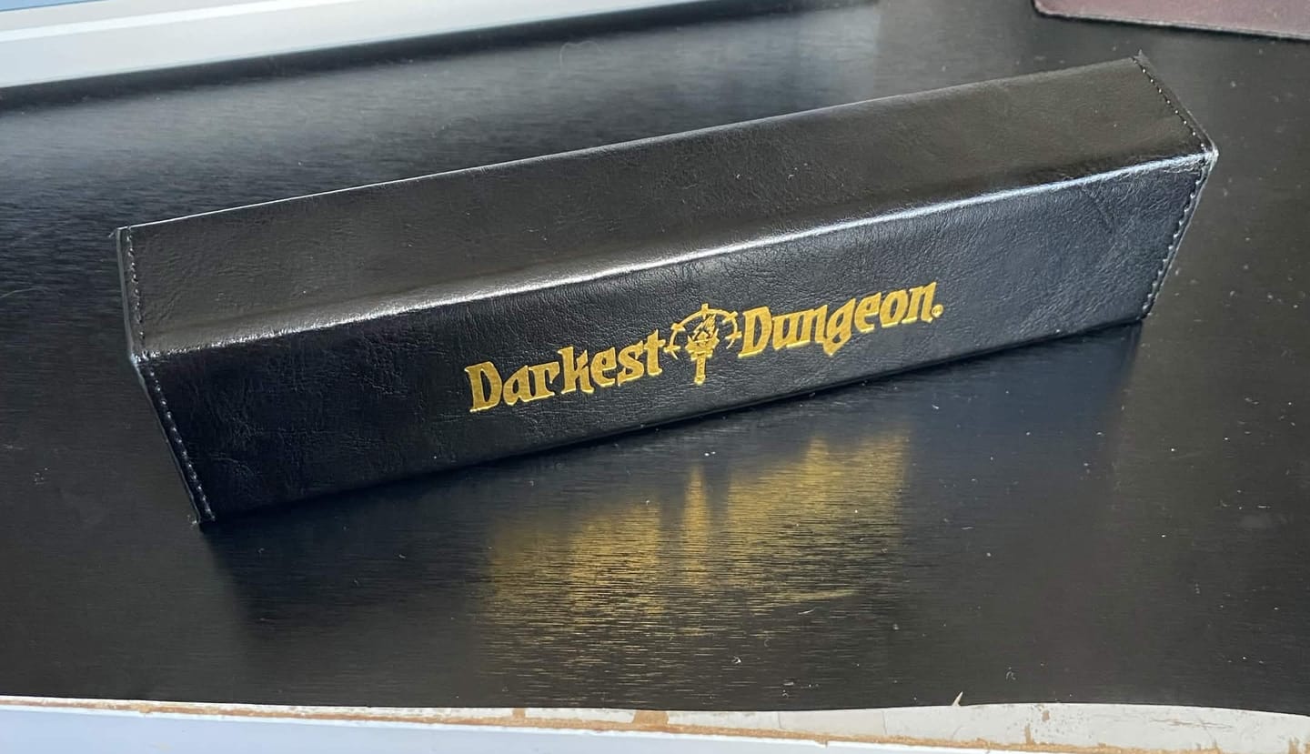Customer photo review of Darkest Dungeon Obsidian Dice Set w/ Leather Case