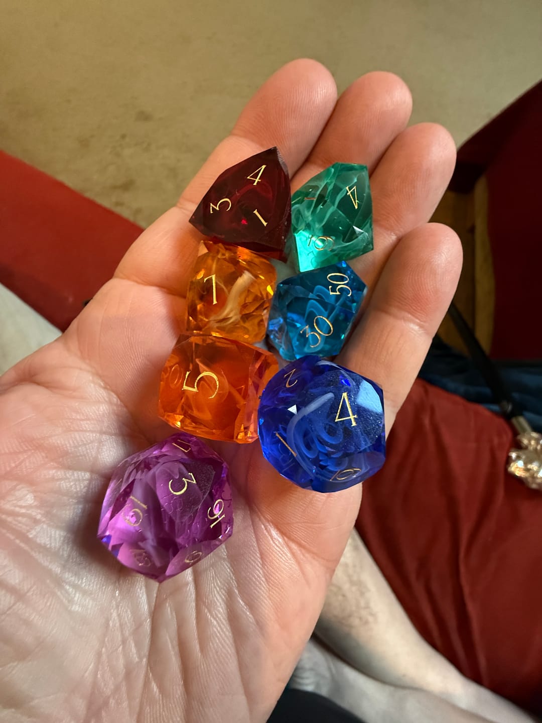 Customer photo review of URWizards D&D Resin Rainbow Engraved Dice Set Multi-faceted Style