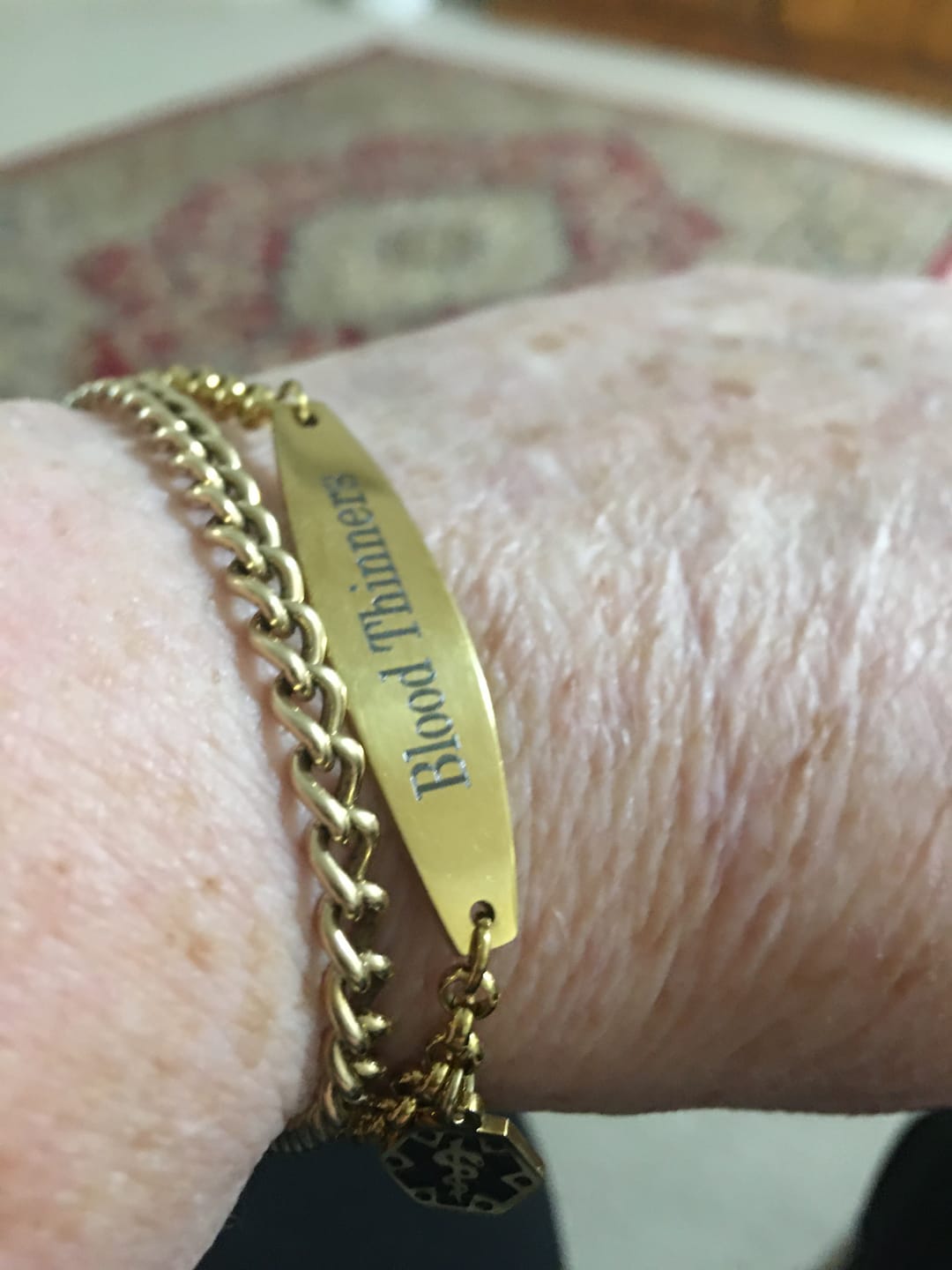 Customer photo review of Gold Colour Medical Alert Bracelet with Medical Charm