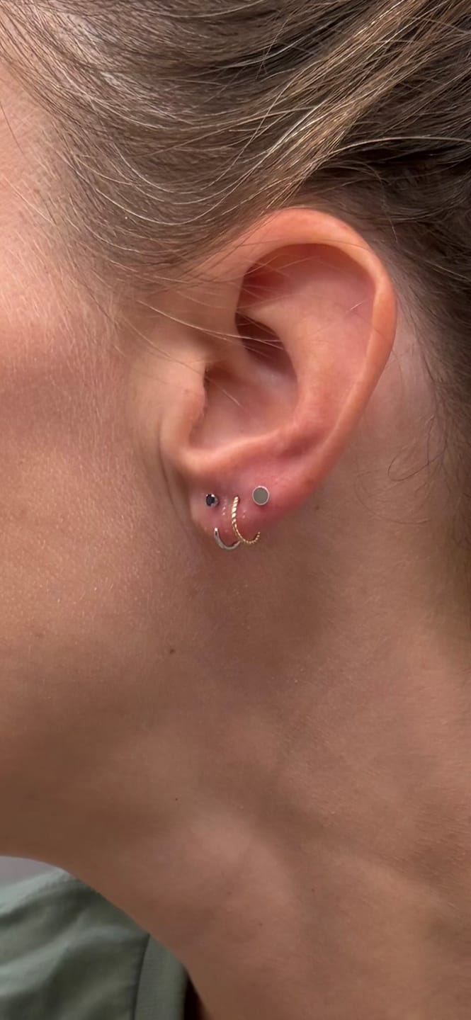 Customer photo review of Stay Close Blue Sapphire Hoops