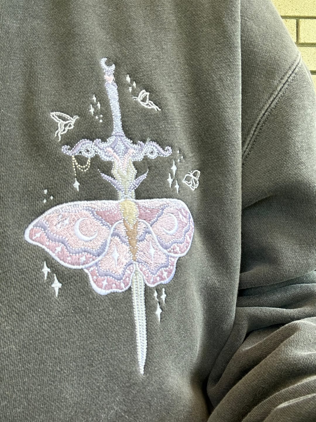 Customer photo review of To Tell a Story crewneck