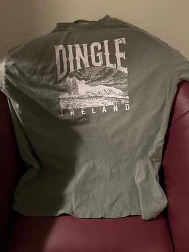 Customer's green Dingle Ireland Vintage Print T-Shirt laid flat, showing the back graphic.