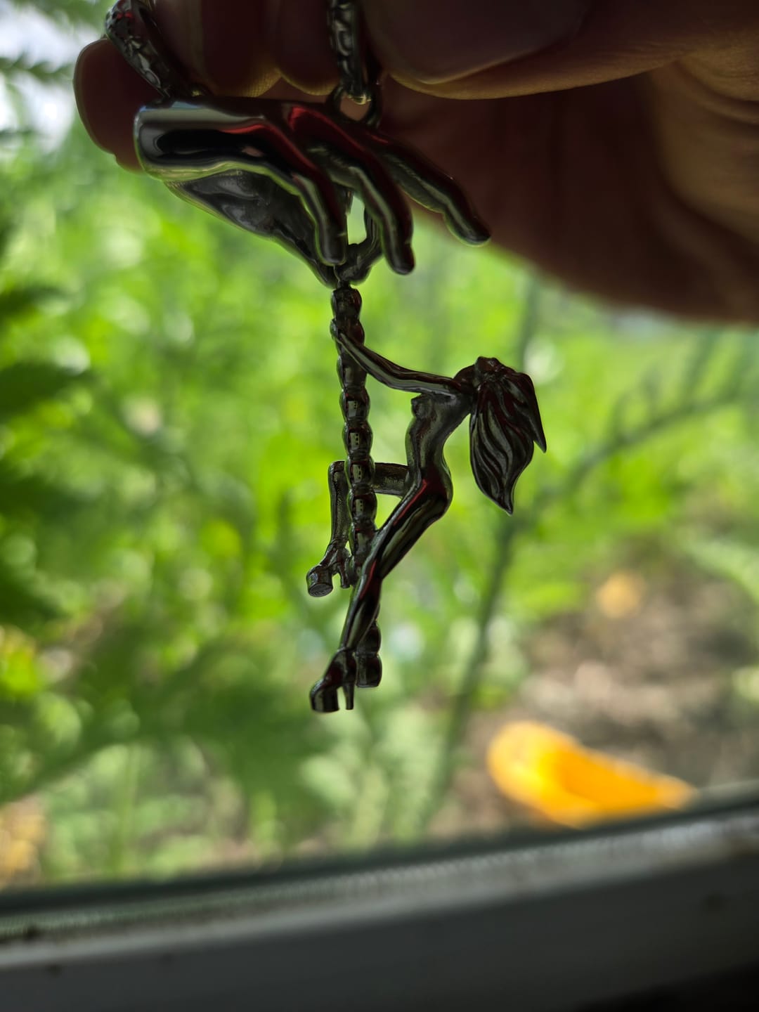 Customer photo review of DANCING WITH DEATH PENDANT