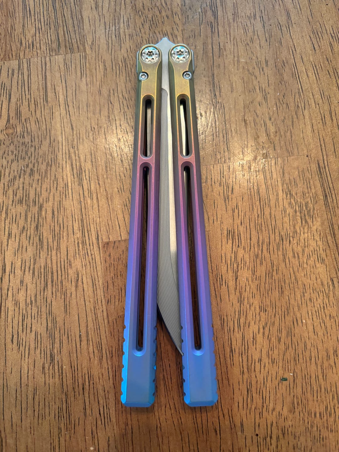Customer photo review of Baliplus Telesto Balisong Titanium Alloy Handle+VG10 Stainless Steel Blade Bushing