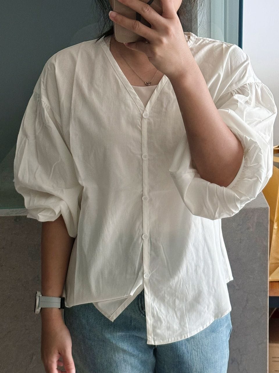 Customer photo review of V-Neck Puffed Long Sleeve Blouse – Relaxed Fit