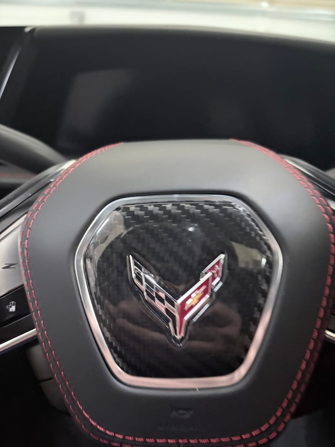 Customer photo review of C8 Corvette Real Carbon Fiber Steering Wheel Airbag Center Cover | Interior Overlay (2020–2026)