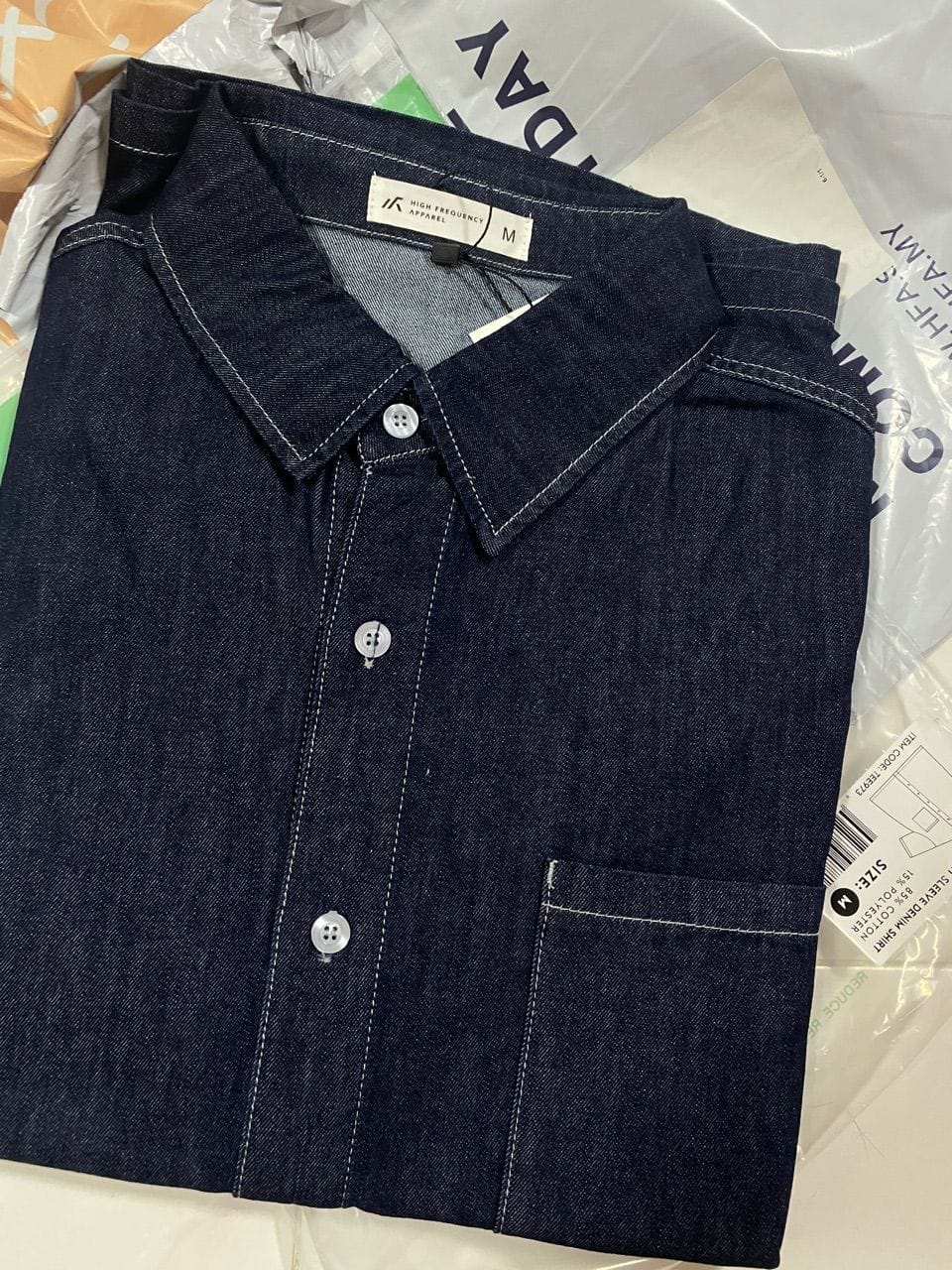 Customer photo review of Oversized Short Sleeve Denim Shirt