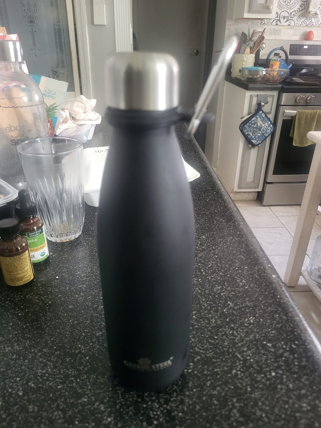 Customer photo review of Stainless Steel Double Wall Vacuum Insulated Water Bottle with Carrier Holder for Adults & Kids - 12 oz, 17 oz and 25 oz