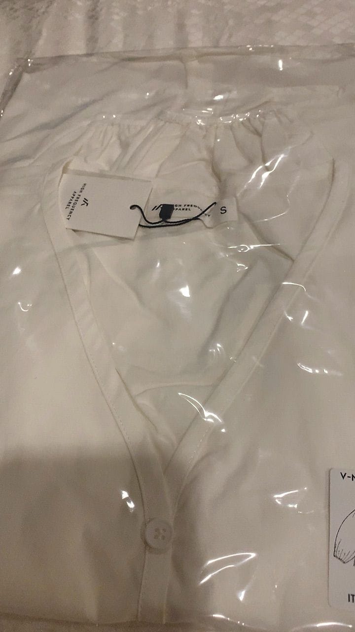 Customer photo review of V-Neck Puffed Long Sleeve Blouse – Relaxed Fit