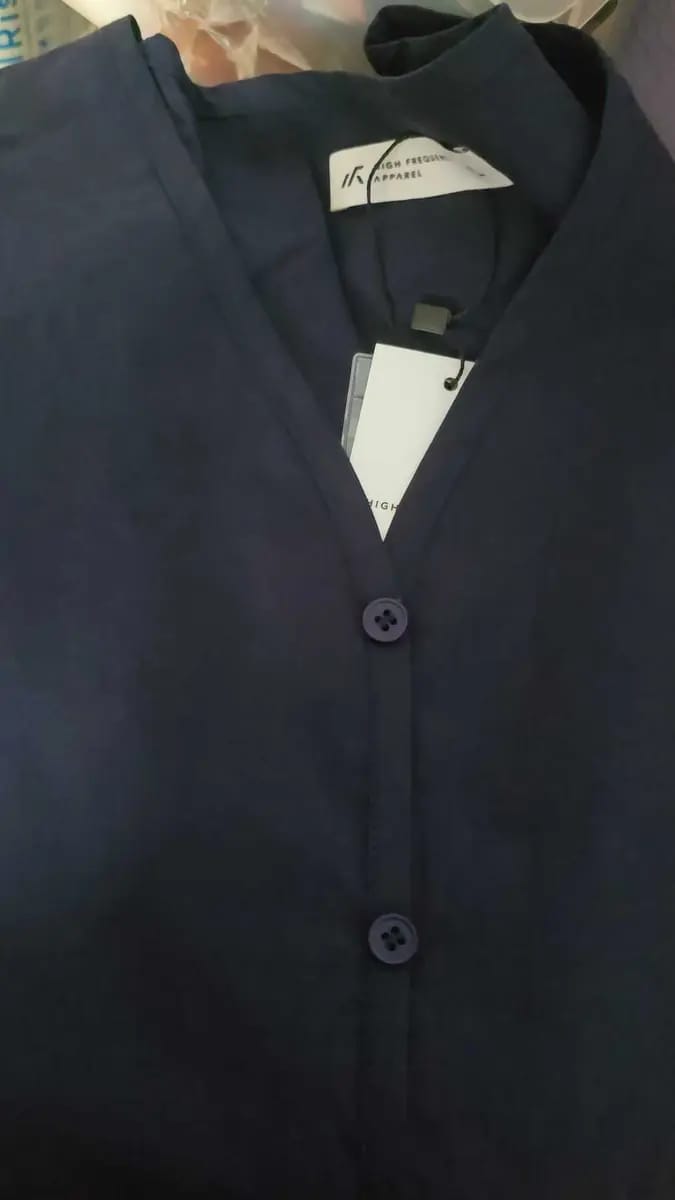 Customer photo review of V-Neck Puffed Long Sleeve Blouse – Relaxed Fit