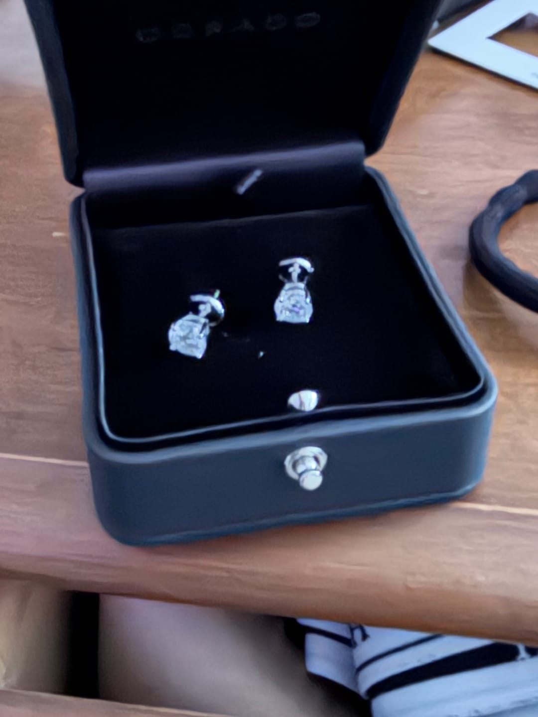 Customer photo review of Round Cut Moissanite Stud Earrings