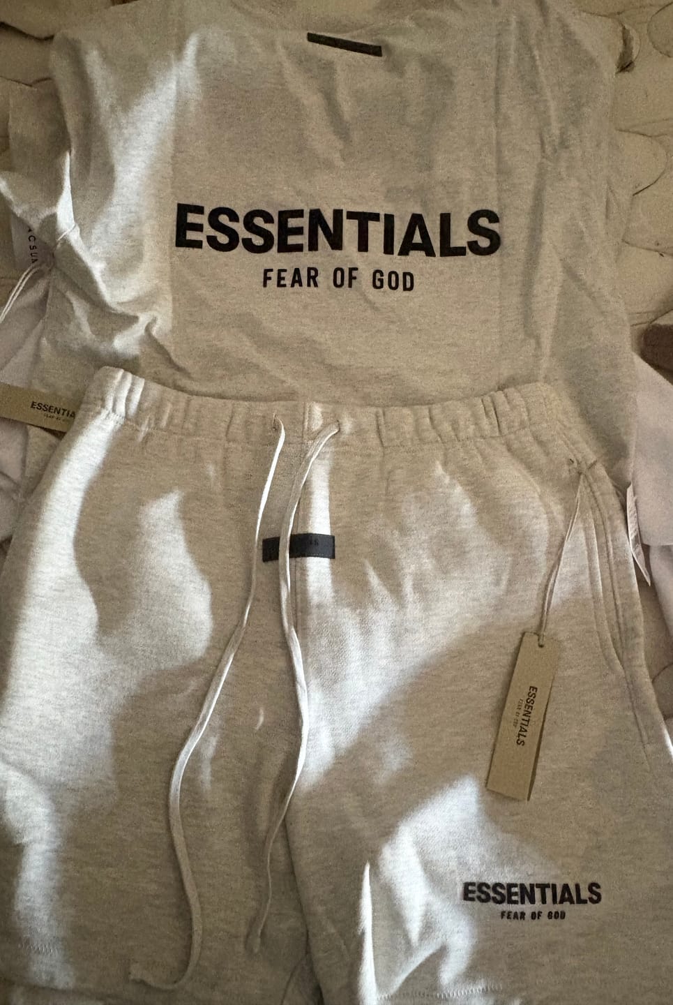 Customer photo review of Fear of God Essentials Tee Light Oatmeal