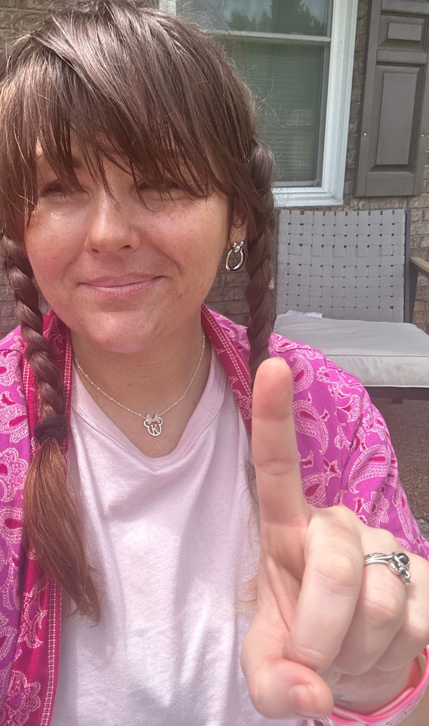 Customer photo review of Leader of the Club Earrings