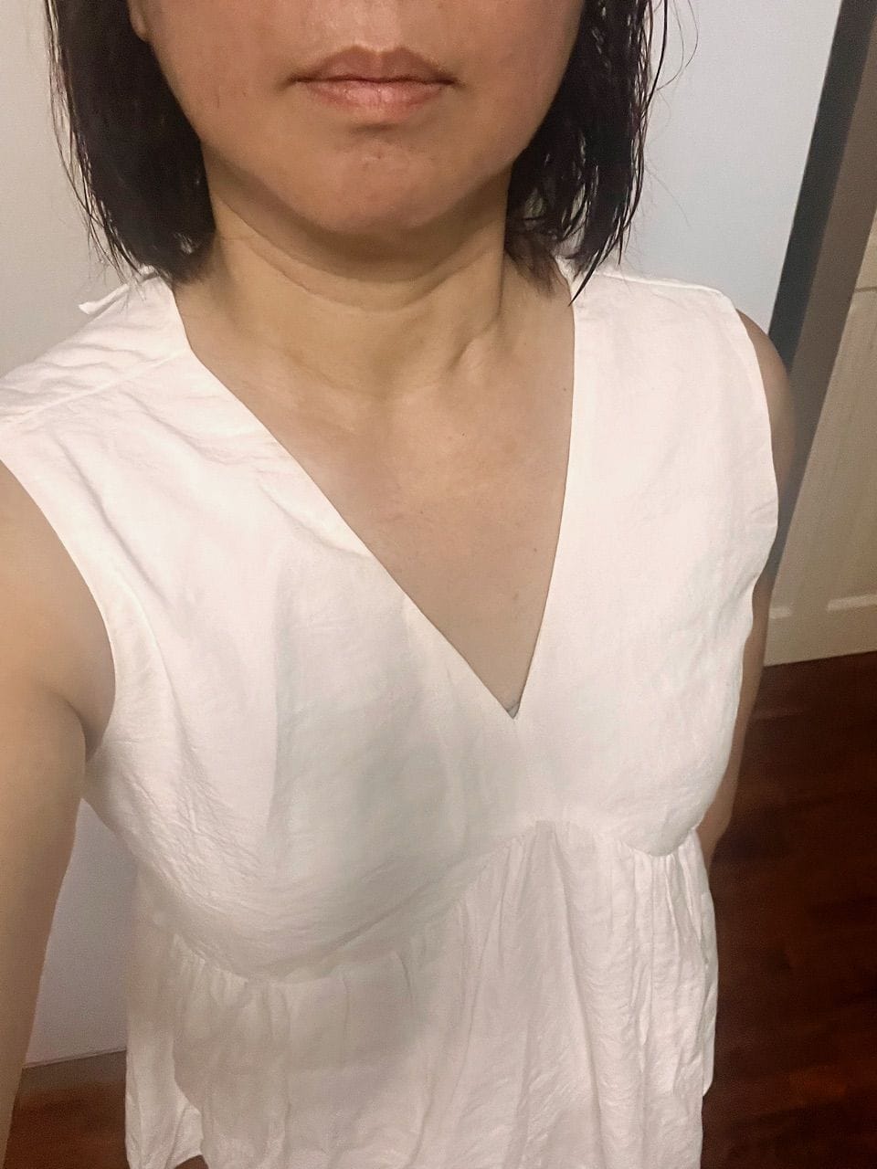 Customer photo review of V-Neck Textured Iron-Free Sleeveless Blouse