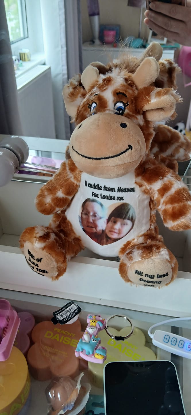 Customer photo review of A Cuddle from Heaven Personalised Photo Teddy Bear