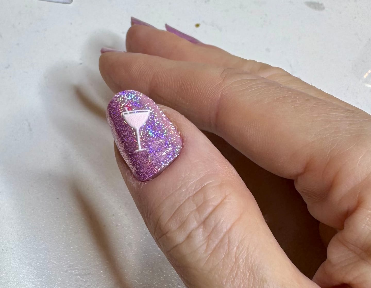 Customer photo review of Pink Holographic Shimmer DIY Semicured Gel Nail Sticker Kit